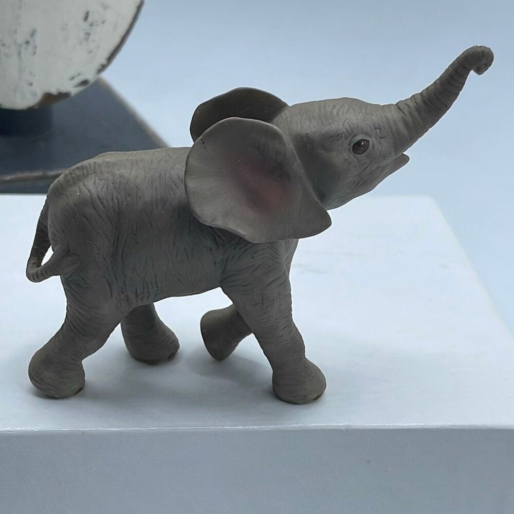 Vintage 1999 Lenox Elephant” Shuffling” figurine.